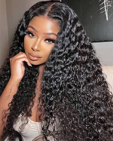 Woman with long, wavy black hair in a close-up shot. Virgin Human Hair Near Duluth Best Sew In Atlanta Beauty 